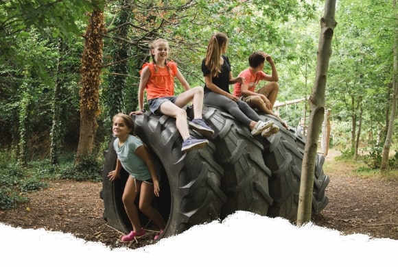 Kids playing in naturescape at Airfield Estate