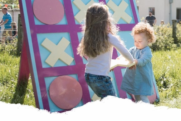 kids playing lawn games at Airfield estate